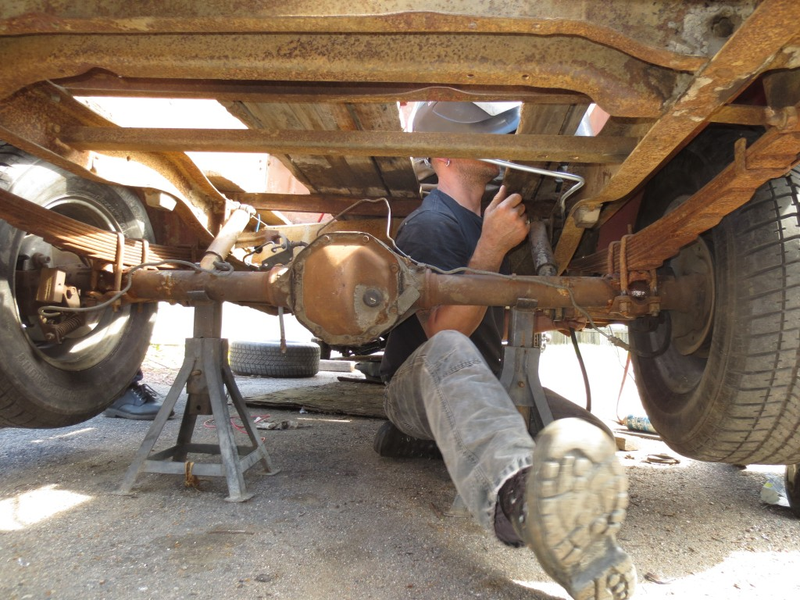 Fellow Lemons racer Bob Harnsberger installing a roll cage in a truck involves crawling around the bed.